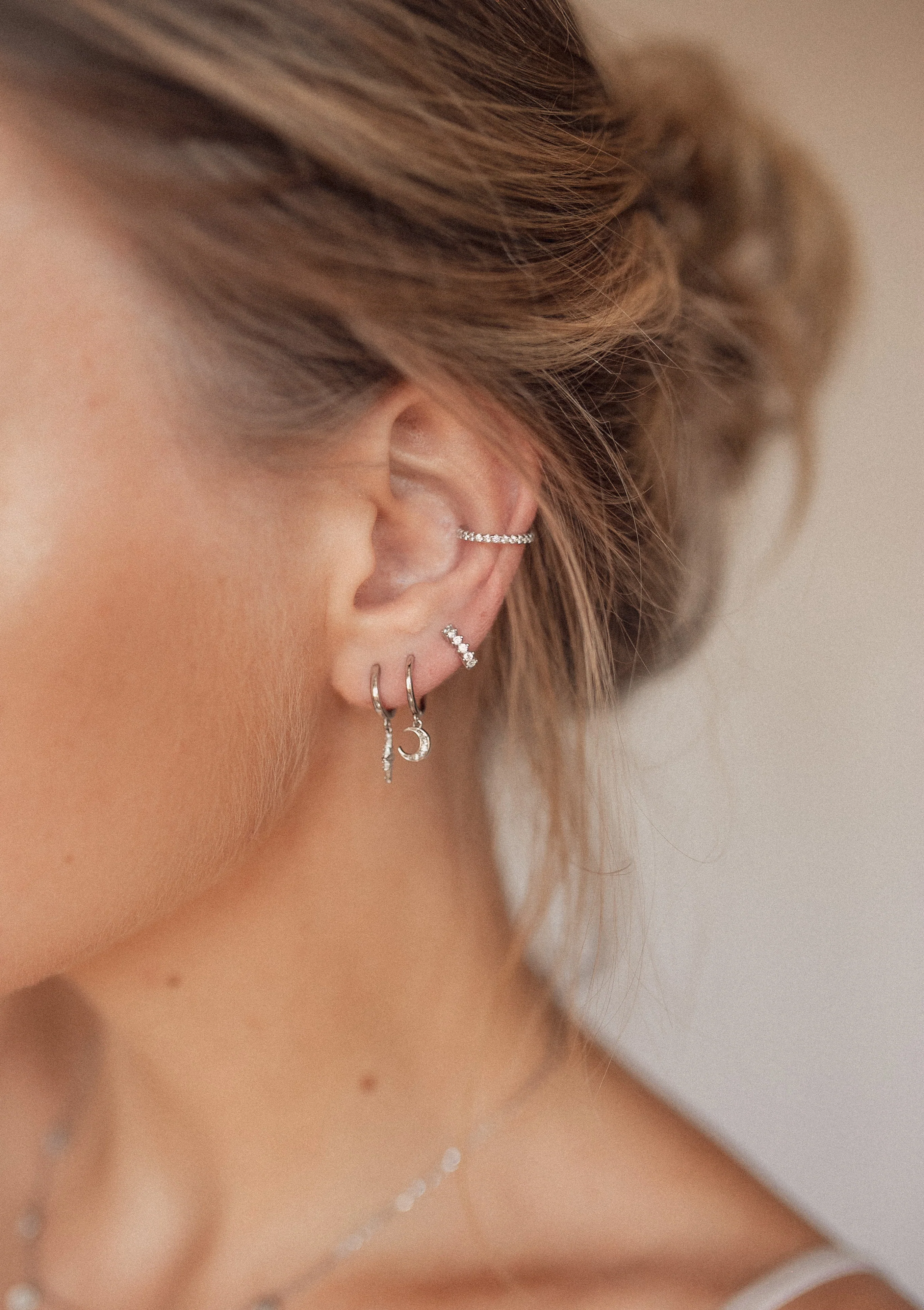 Crescent Moon Huggie Earrings Sterling Silver - Image 5